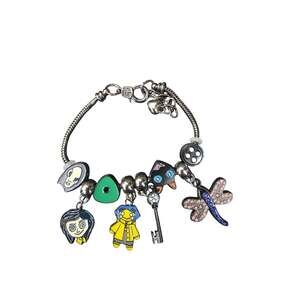 Coraline Inspired Charm Bracelet Blue Hair Doll Cat Key Dragonfly Button Eye NEW